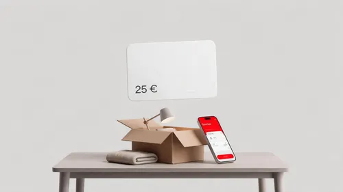 OTTO voucher above an opened parcel, a lamp and a smartphone showing the voucher screen