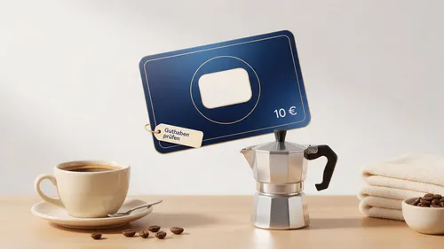 Tchibo Geschenkkarte über Kaffeetasse, Espressokocher und Handtüchern mit Anhänger zum Guthaben prüfen